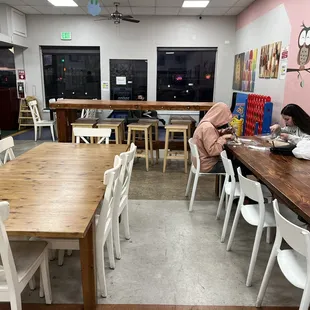 a woman sitting at a table
