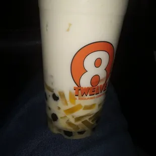 Peach smoothie and mango strips and boba
