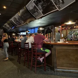 people sitting at the bar