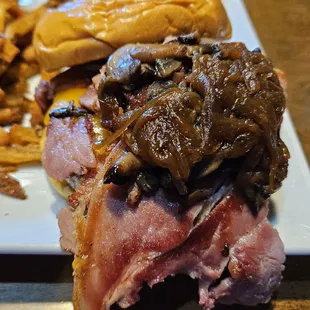 Burger with Edward&apos;s ham, cheddar, caramelized onions and sautéed mishrooms