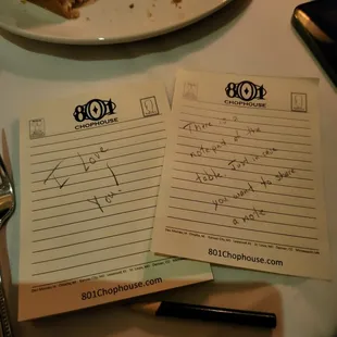 There was a little notepad on the table.