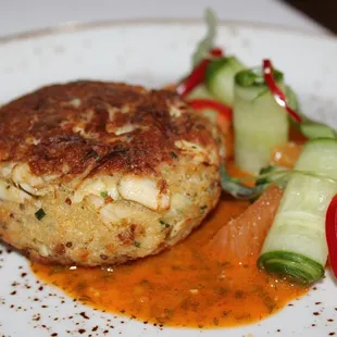 The Maryland Crab Cake was made with Fresno Vinaigrette, Cucumber, Cara Cara Orange.