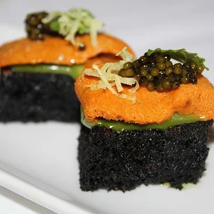 The Uni Toast was made with Hackleback Caviar, Squid Ink Milk Toast, Coconut, Basil, &amp; Fleur De Sel.