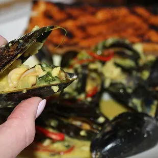 The plump mussels soaked up the creamy, Thai spiced coconut curry broth and took on the flavor making for juicy bites.