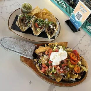 HH Street tacos and HH fajita nachos