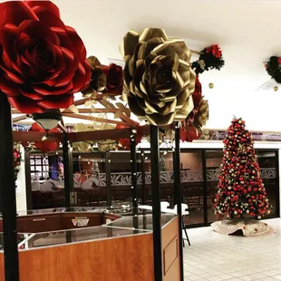 Jumbo red &amp; gold roses displayed at First Assembly Of God Church for Christmas.