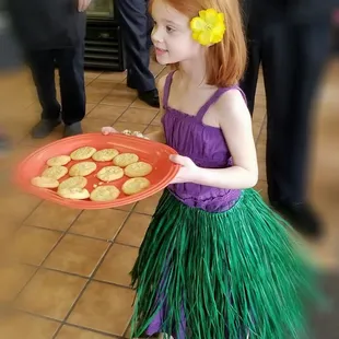Our lil Hula Princess handing out Lilikoi Macnut Cookies at our Grand Opening