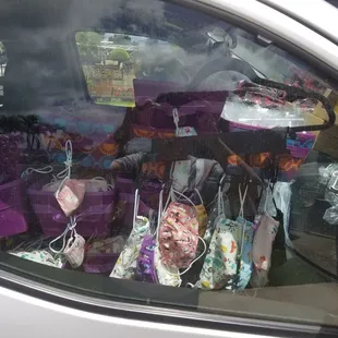 I see masks in the window of the van!  They&apos;re made in Korea!