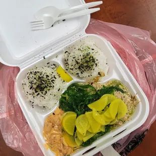 spicy mayo tuna (left) and california spicy mayo tuna (right) with seaweed salad and yellow radish