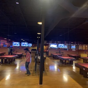 13 Billiard tables with TV's to watch and music to enjoy. Servers deliver food and drinks straight to your table so you never miss a shot.