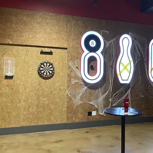 billiards and darts in the background