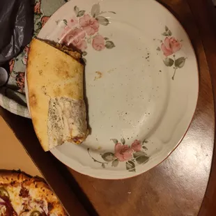 a slice of cheese pizza on a plate