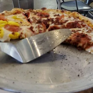 A pepperoni 14 inch with half bacon and half peppers