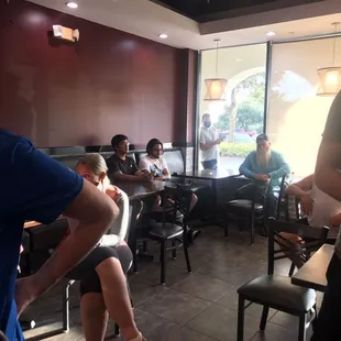Couldn&apos;t get all the people wait for their food at the restaurant in the photo..plus more people waiting outside
