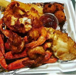 Fried snow crabs w/ lobster &amp; Shrimp , fries , hush puppies