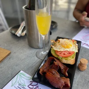 Avocado toast and a side of bacon