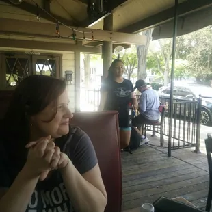 a woman sitting at a table