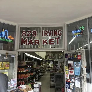 a storefront with a variety of items