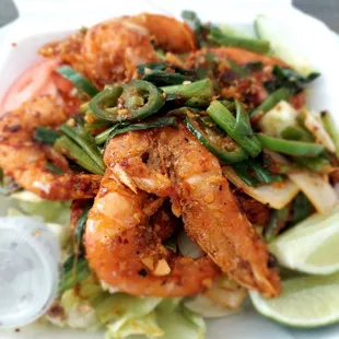 shrimp and vegetables in a styrofoam container