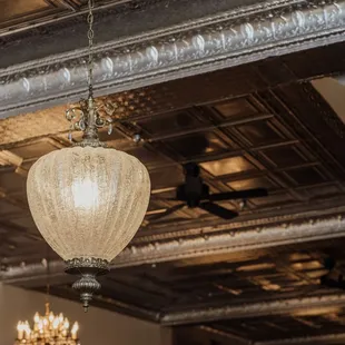 Vintage chandeliers grace 828 The Turn.