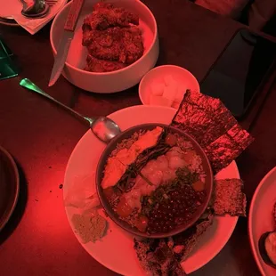 Fried chicken and raw seafood over rice
