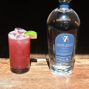 Mexican Firing Squad- Tequila, Pomegranate, Lime, Bitters, Soda.