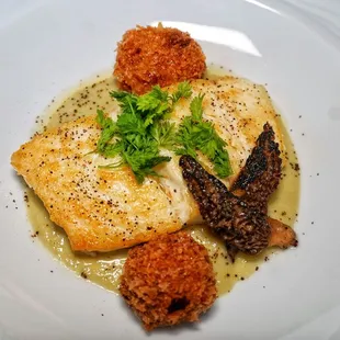 Halibut in a leek sauce with panko croutons and morel mushrooms