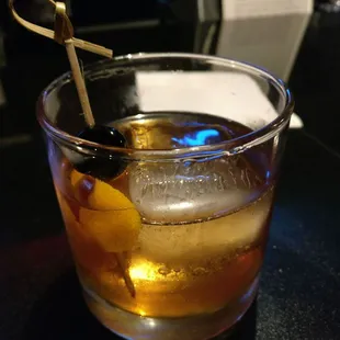 Bourbon old fashioned. Complete with large ice cube, fancy cherry, and an awesome bartender!