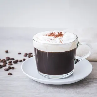a cup of coffee on a saucer