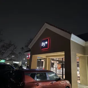 a car parked in front of the building