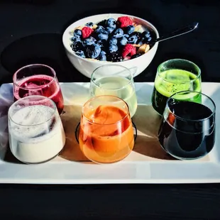 The Juice Flight and Yogurt Bowl. Fruits and Almonds were added.  Juices were great.