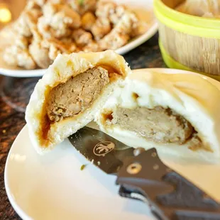 G18. Pork Bun $2.50 sliced in half