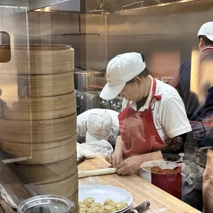 a group of chefs preparing food