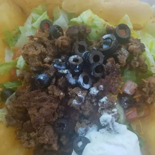 First and last time ordering  the so called taco salad was falling apart ground beef was old. then no napkins or fork