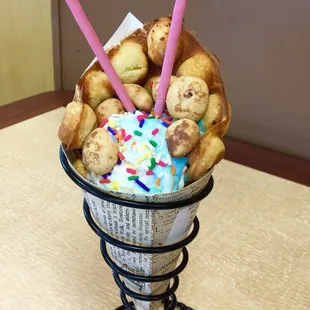Waffle cone + birthday cake ice cream topped with Panda cookies, sprinkles and Pocky sticks!!