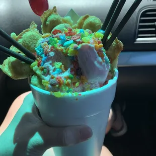 Strawberry ice cream with chocolate pocky sticks, fruity pebbles and panda cookies!