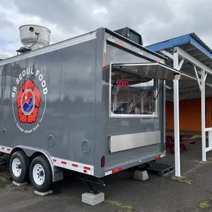 a food truck parked in front of a building