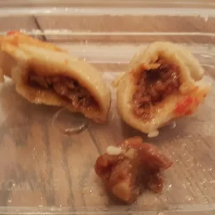 Their dumplings look like this.  Yes that is a piece of cartilage and bone.