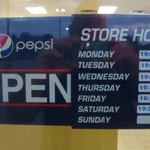 Hours of operation, front entry door.