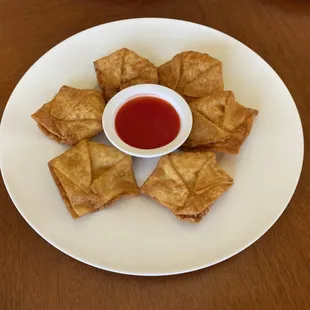 Crispy fried puffs with a delicious, sweet cream cheese filling.