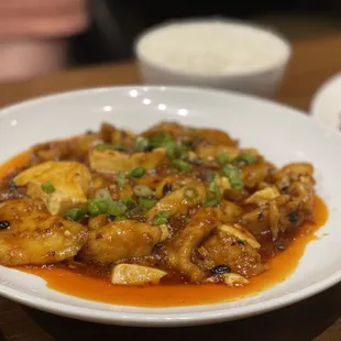 Mapo Tofu Fish. Fish is super flaky, tender, we'll seasoned and thick. Loved this dish.