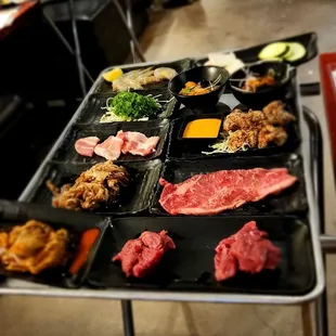 Shrimps, octopus, sirloin, seaweed salad, salmon carpaccio