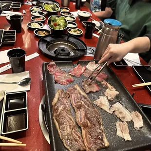 Grill and banchan (side dishes)