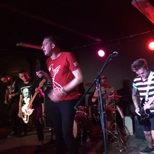 a band performing at night