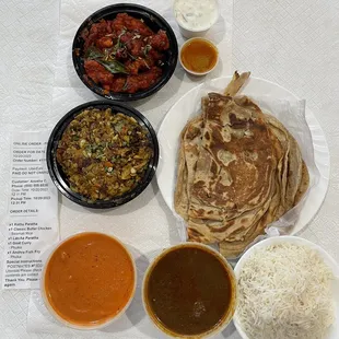 Andhra Fish Fry, Kothu Paratha, Classic Butter Chicken, Goat Curry, Latcha Paratha, Phulka, Basmati Rice