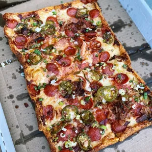 Fire House Special {pepperoni, bacon, sautéed jalapenos, green onions, choice of honey or ranch drizzle on the side}