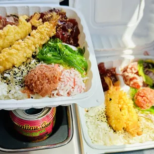 a container of rice, meat, and vegetables