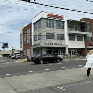 a woman crossing the street