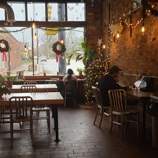 a man sitting at a table in a restaurant