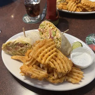 Buffalo chicken wrap with waffle fries